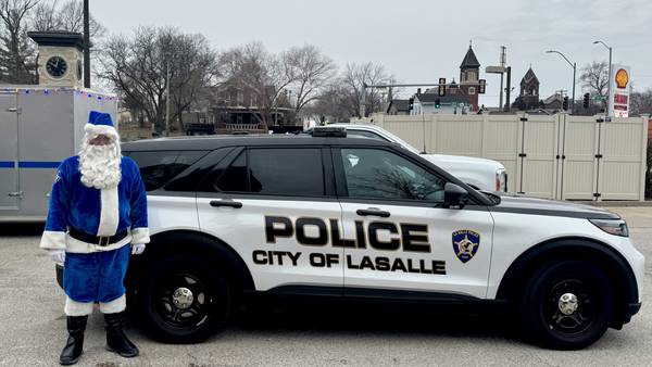 La Salle Officer Santa delivers gifts to 100 children