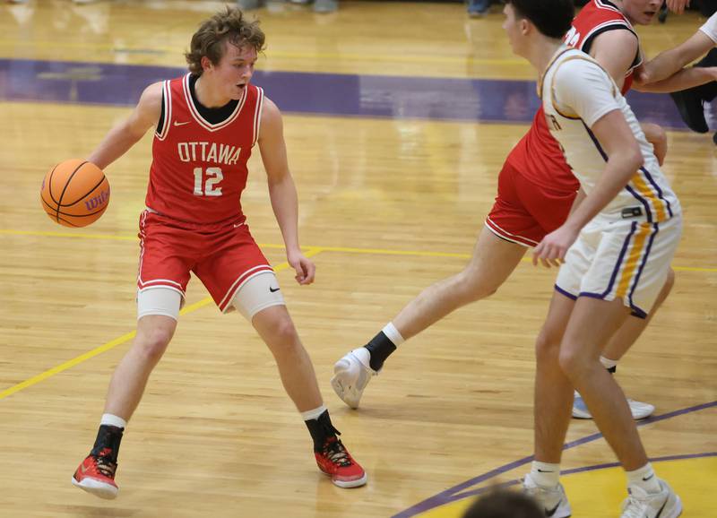 Ottawa's Jack Carroll looks to pass the ball off against Mendota on Tuesday, Jan. 6, 2026 at Mendota High School.