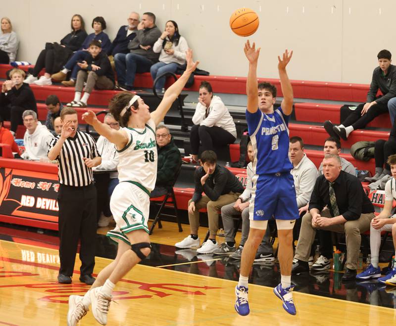 Princeton's Jack Oester shoots a jump shot over Eureka's Teagan McLaughin during the Colmone Classic on Thursday, Dec. 11, 2025 at Hall High School.