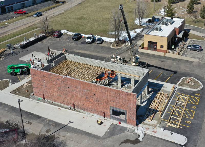 Crews work on moving materials in place on the site of a future Chipotle Mexican Grill on Wednesday, March 18, 2026 in Ottawa. The Ottawa City Council approved the project last June, and the construction has been ramping up this month. It is located on Etna Road next to Thorntons.