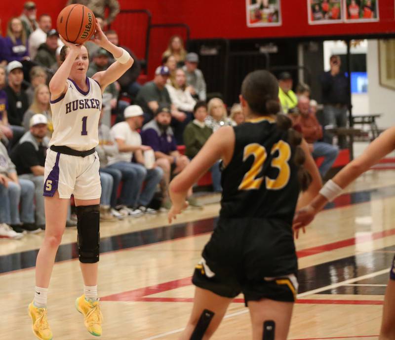Serena's Gwen O'Connell shoots a jump shot over Ashton-Franklin Center's Brianna Gonnerman during the Class 1A Regional final on Thursday, Feb. 15, 2024 at Earlville High School.