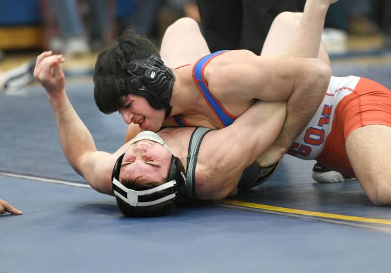 Oregon's Anthony Bauer (top) holds Winnebago's Lucas Cowman to the mat in the third-place match at 160 pounds at the 1A Polo Wrestling Regional held at Eastland High School on Saturday, Feb. 4.