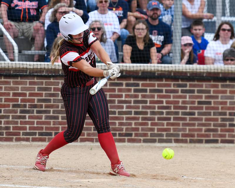 Yorkville's Ellie Fox (13) gets a base hit during the sectional semifinal game on Tuesday June 3, 2025, while they travel to take on Oswego High School.