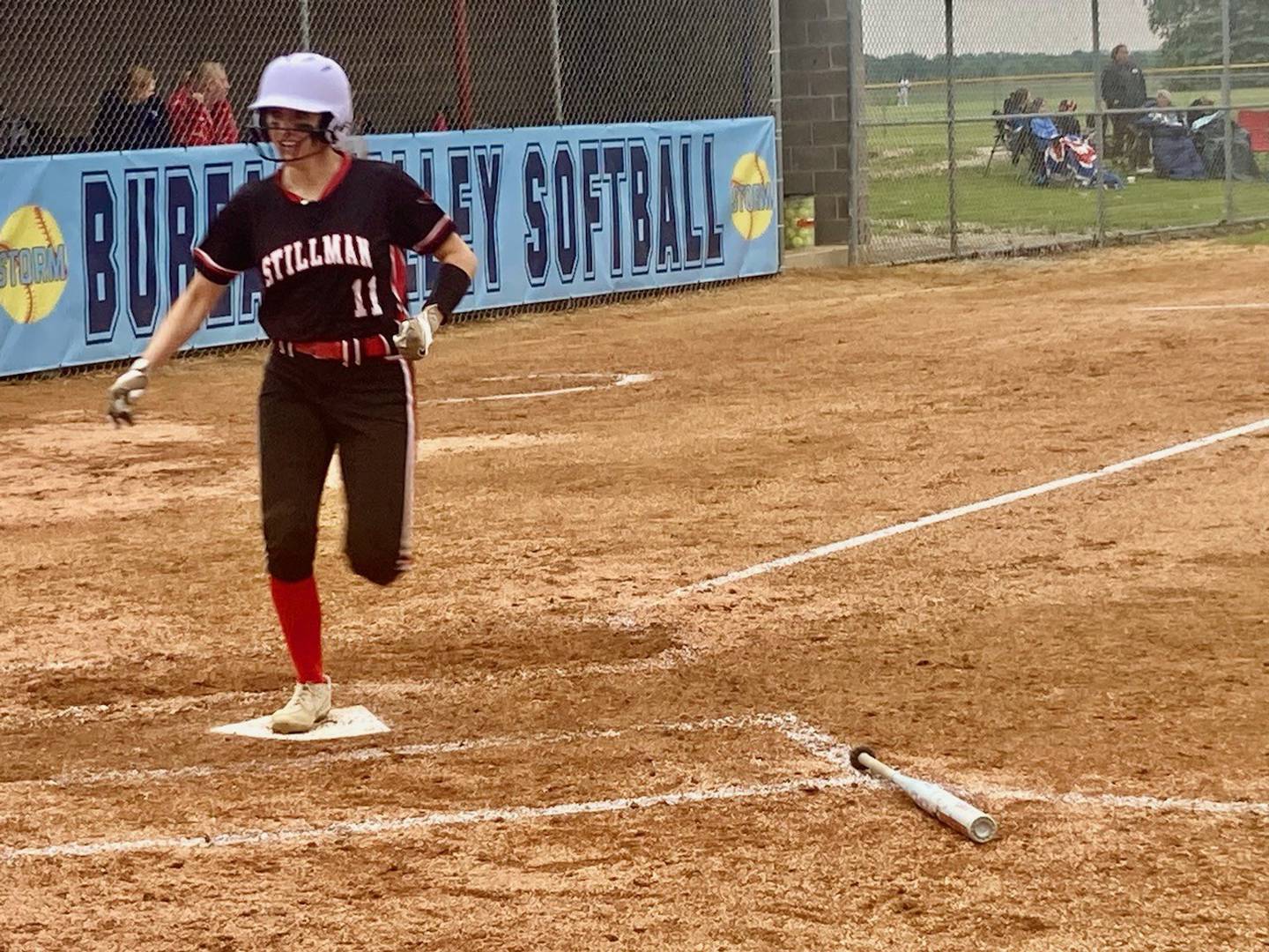 Stillman Valley's Ellie Larson steps on the plate for one of six Cardinals runs in the fourth inning to break open Wednesday's regional semifinal game at Manlius. The Cardinals won 10-0 in five innings.