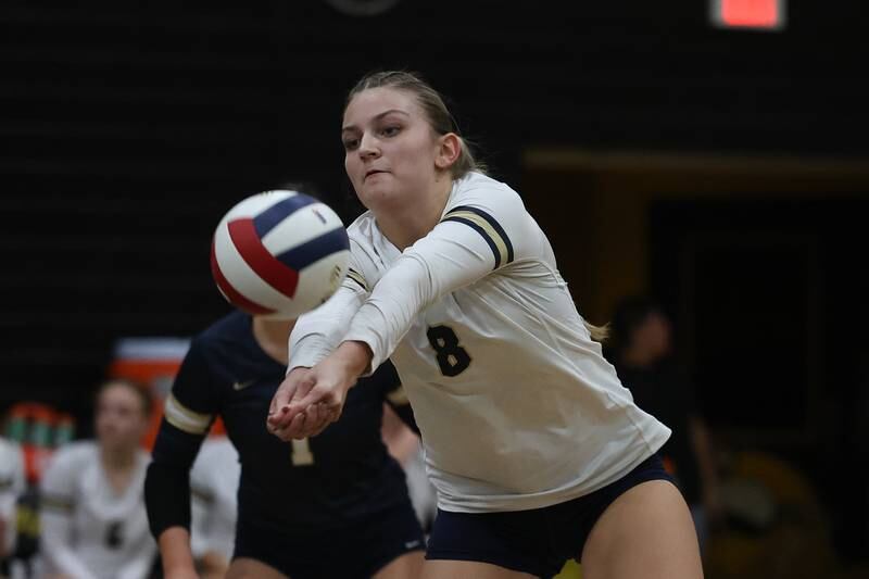 Lemont’s Sophia Swiderski gets the dig against St. Laurence in the Class 3A St. Laurence Sectional championship on Thursday, Nov. 7, 2024 in Burbank.