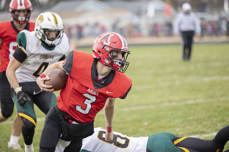 Amboy’s Tucker Lindenmeyer picks up yards Saturday, Nov. 12, 2022 against St. Thomas More during the 8-man semifinals.