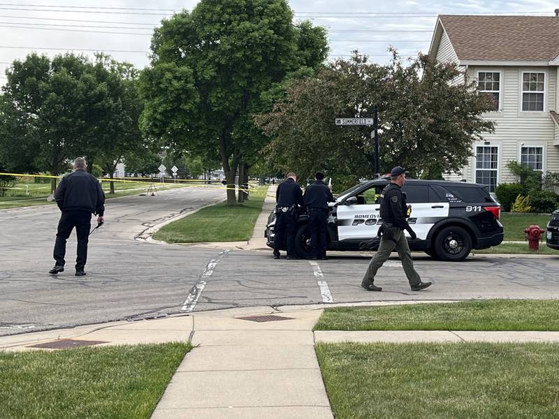 Officers at the intersection of Sierra Trail and Summerfield Drive in Romeoville on Thursday, May 25, 2023. A suspect was apprehended in a shooting that wounded a Romeoville police officer.