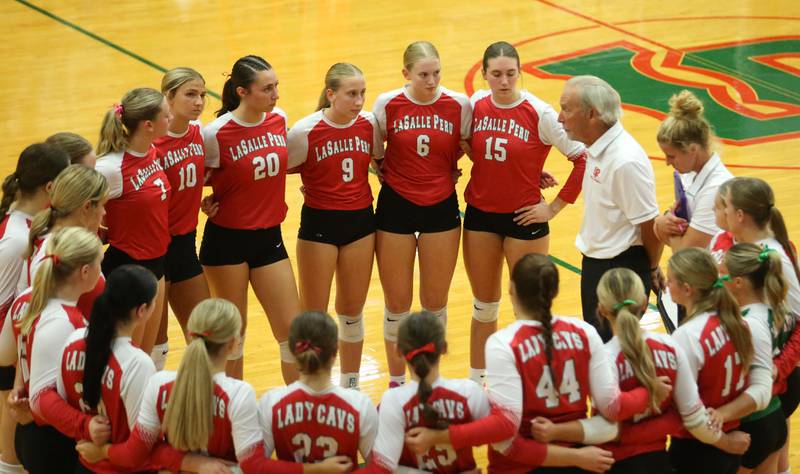 L-P head volleyball coach Mark Haberkorn talks to his team during a timeout while playing Sycamore on Tuesday, Sept. 23, 2025 in Sellett Gymnasium at L-P High School.