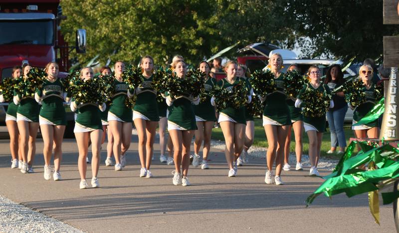 The St. Bede cheerleaders march in the St. Bede Homecoming Parade on Friday, Sept. 29, 2023 at St. Bede Lane.