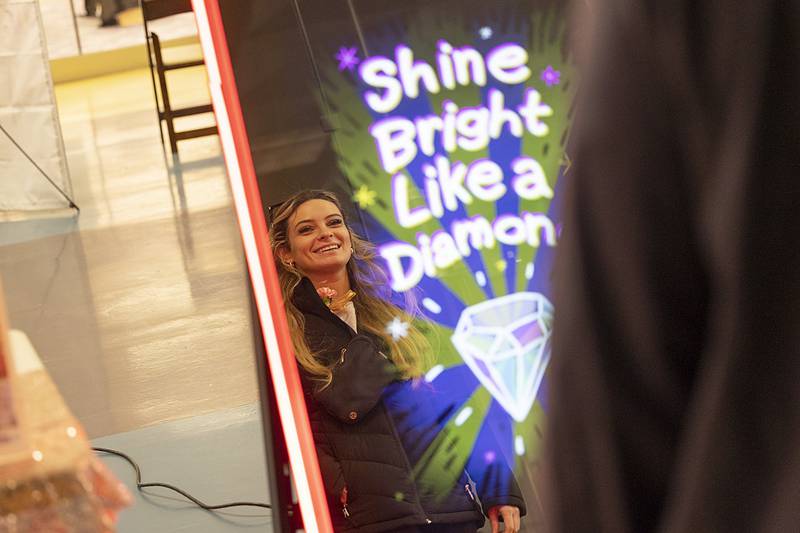 Jasmine Lloyd smiles for an interactive photo booth Sunday, Feb. 2, 2025, at the Sauk Valley Wedding Expo in Sterling.