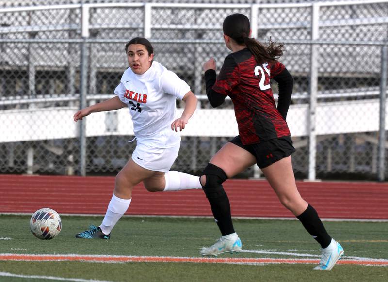 DeKalb's Alexia Ortiz looks to get by a Rockford East defender during their game Tuesday, March 25, 2025, in the Barb Fest tournament at DeKalb High School.