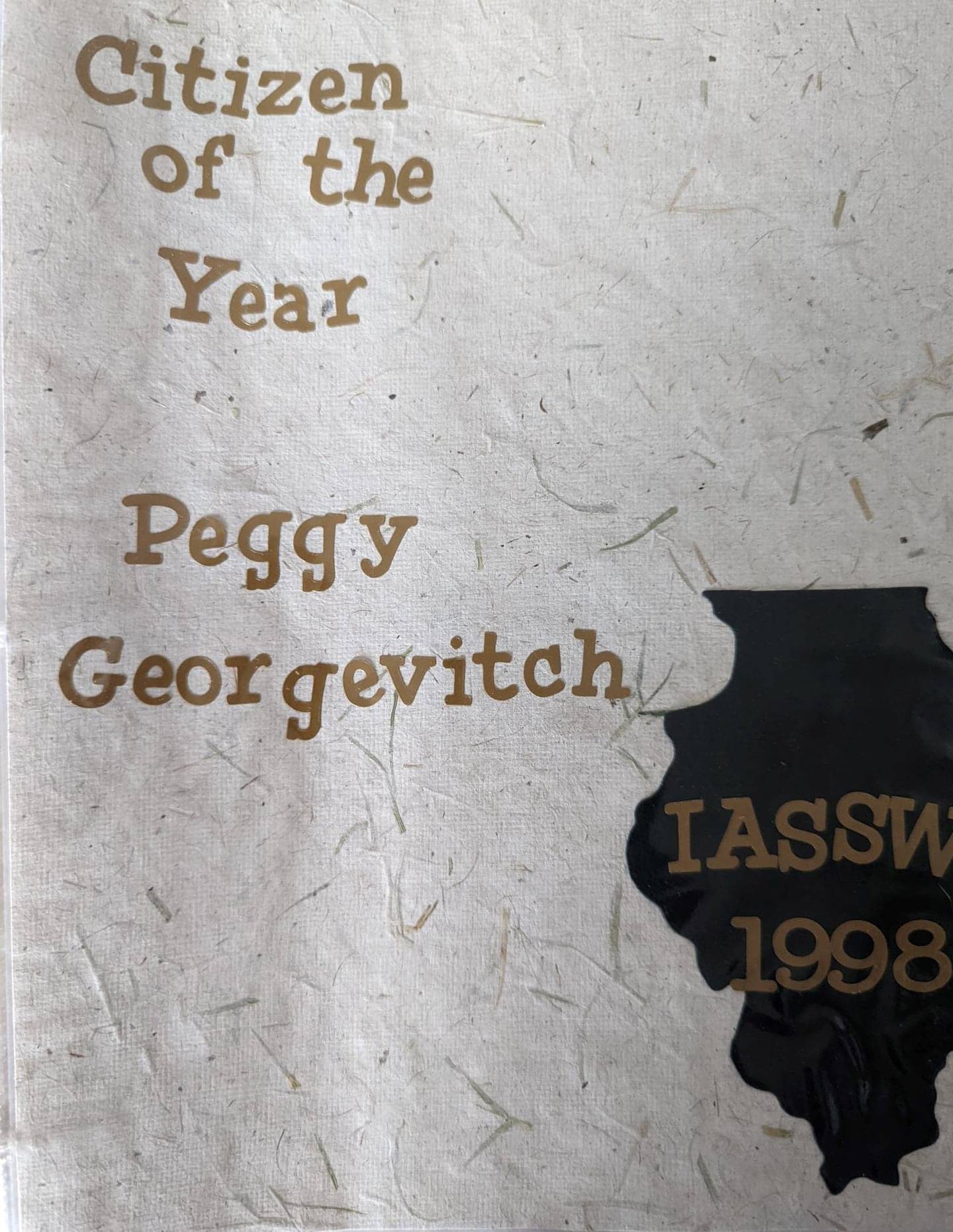 Pictured is the title page from Peggy Georgevitch's scrapbook of newspaper story and clippings dating back to when the Illinois Association of School Social Workers named Georgevitch Citizen of the Year in 1999.