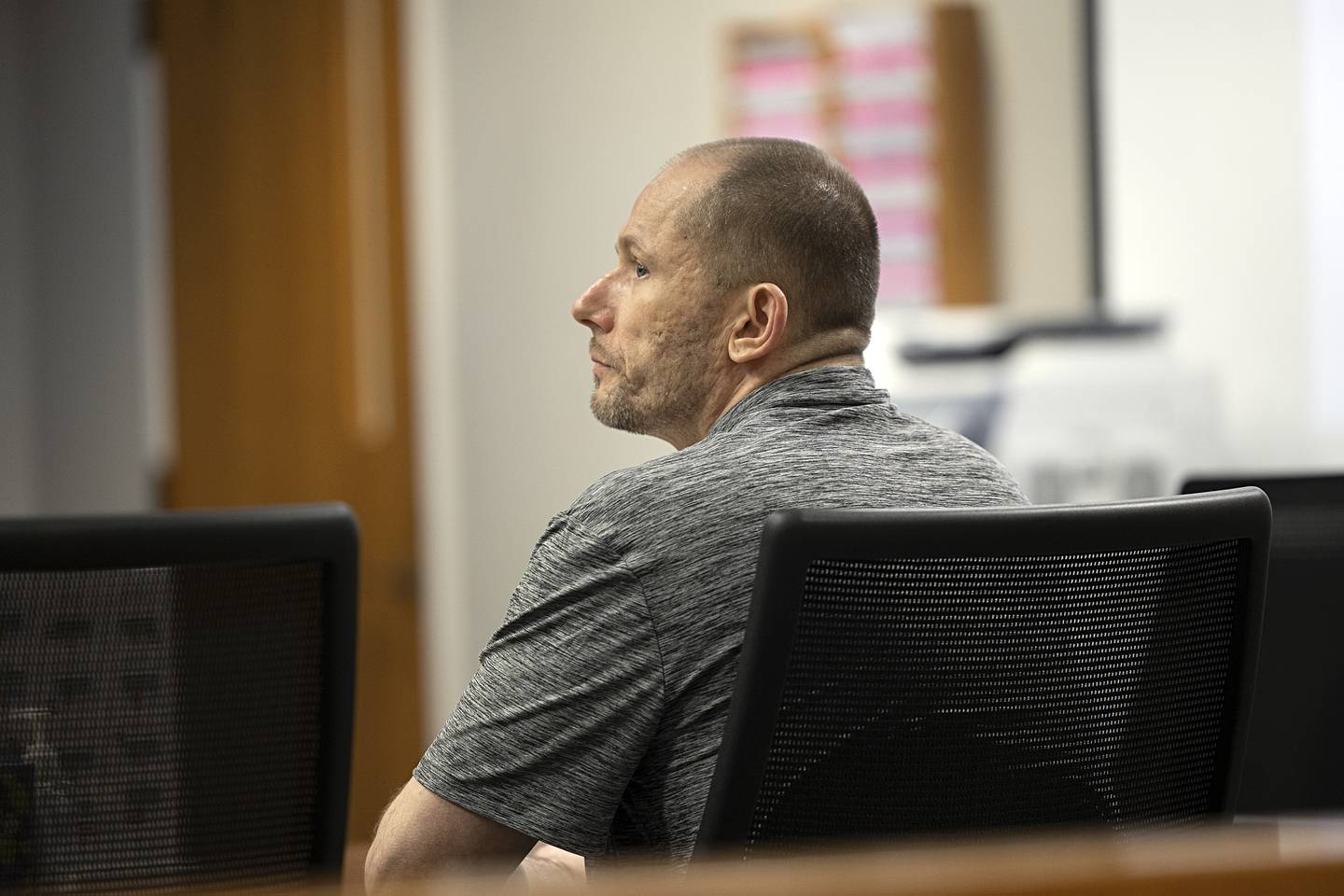 Steven W. Coleman listens to the cross examination of ex-girlfriend Carly Fischbach on Thursday, July 18, 2024, at the Whiteside County Courthouse, Morrison. Coleman is accused of setting the Western Apartments in Sterling on fire in June 2020. Three people died in the blaze.