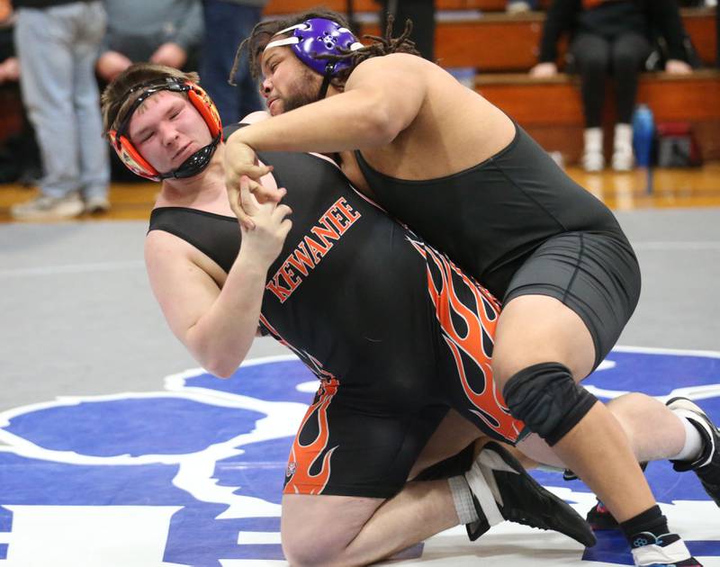 Dixon's Dylan Bopes falls on top of Kewanee's Airies Simmons during the Class 1A Regional wrestling meet on Saturday, Jan. 31, 2026 at Princeton High School.