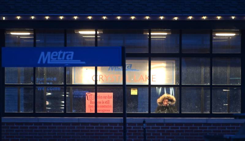 Metra reduced its operating trains on Friday, Jan. 23, 2026 due to the dangerous cold weather.  The number of riders decreased as well which  left commuters, including a solo rider on the Union Pacific Northwest line, seeking warmth under the shelter heat lamps in Crystal Lake.