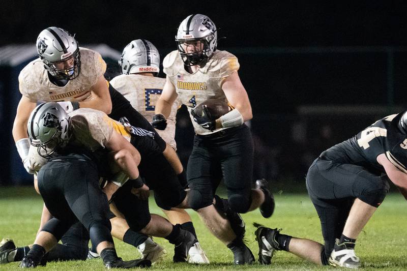 Kaneland's Tyler Bradshaw (1) carries the ball against Sycamore during a football game at Kaneland High School in Maple Park on Friday, Sep 30, 2022.
