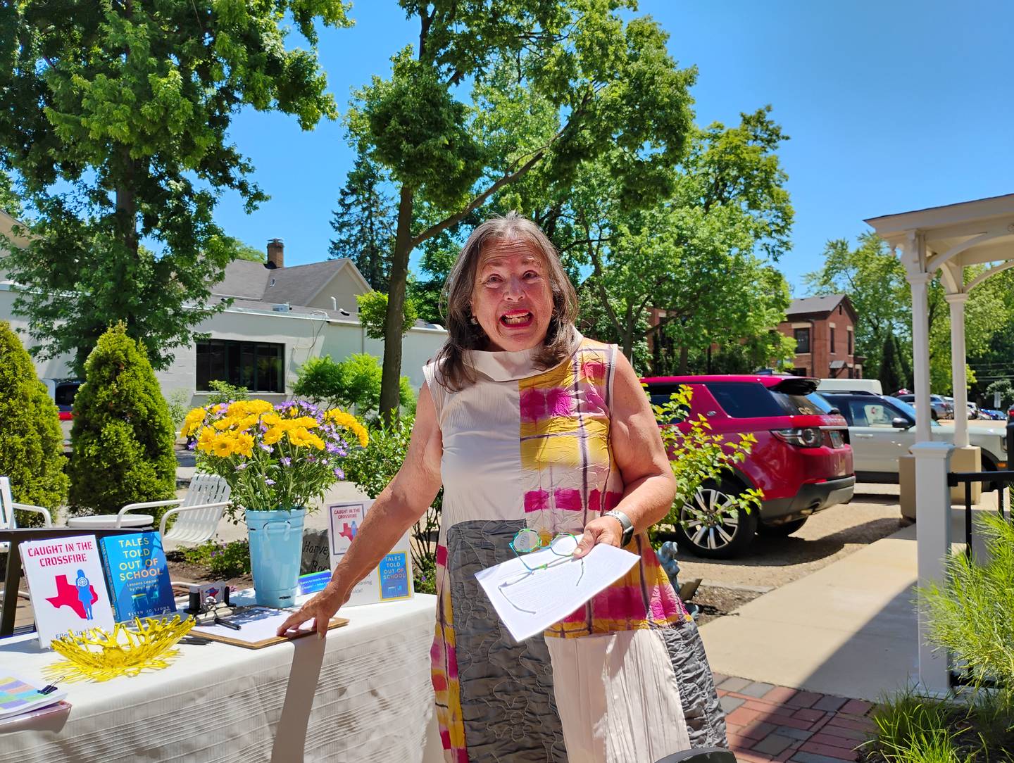 Geneva author Ellen Jo Ljung disusses her first novel, 'Caught in the Crossfire' at Harvey's Tales Saturday, June 28.