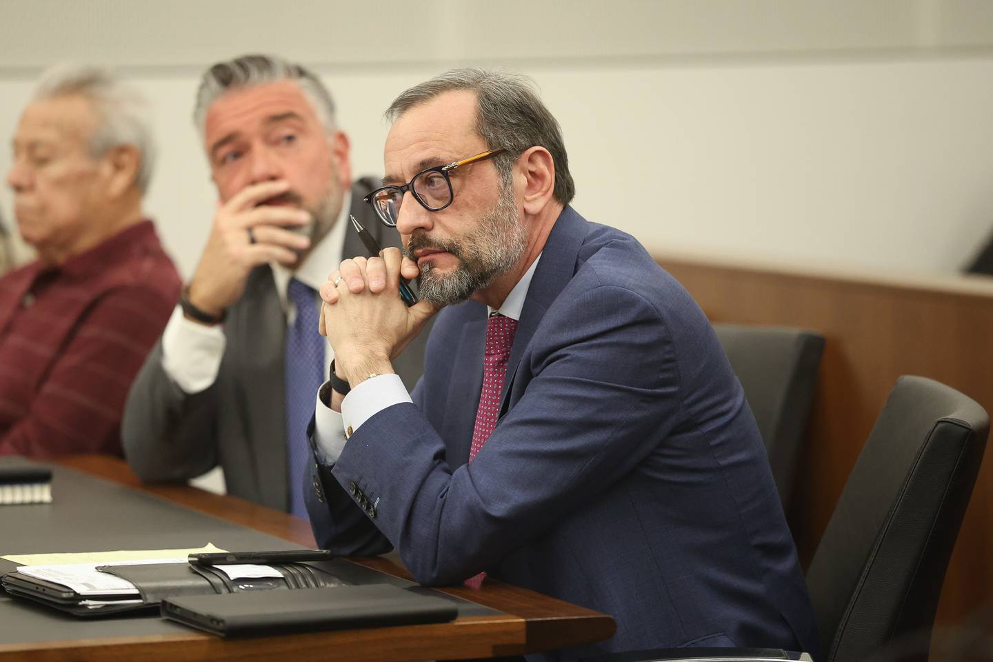Defense Attorney John Fotopoulos listens to the prosecutors during a petition by prosecutors for Gilbert Bernal to find an alternate address further away from the residence of Will County State's Attorney James Glasgow on Thursday, Feb. 26, 2026 at the Will County Courthouse in Joliet. Gilbert Bernal, 82, formerly of Michigan, is charged with the 1988 murder of his wife Joan Bernal, 34.