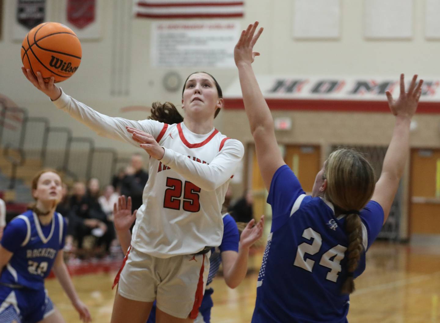 Huntley's Evelyn Freundt drives tot eh basket against Burlington Central's Ali Kowal during a Fox Valley Conference girls basketball game on Tuesday Jan. 13, 2026, at Huntley High School.