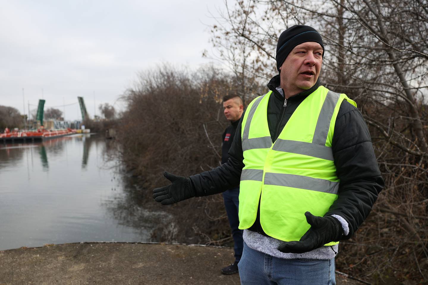 Kirk Sunderman, Project Engineer for the Brandon Road Interbasin Project with the U.S. Army Corps of Engineers Rock Island District, goes over the lock and dam plans on Wednesday, Dec. 6, 2023 in Joliet. The U.S. Army Corps of Engineers plan to extend the guide walls and include deterrents to prevent upstream movement of invasive carp and other unwanted aquatic species.