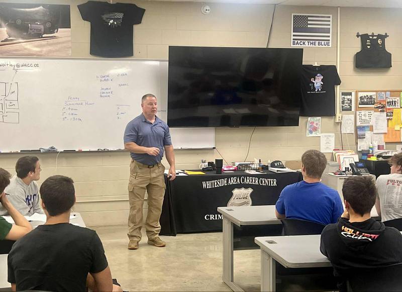 Instructor Michael Wolfley speaks to his Criminal Justice program students at the Whiteside Area Career Center in Sterling.