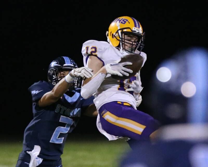 Mendota's Braiden Freeman makes a catch over Bureau Valley's Corban Chhim on Friday, Sept. 22, 2023 at Bureau Valley High School.