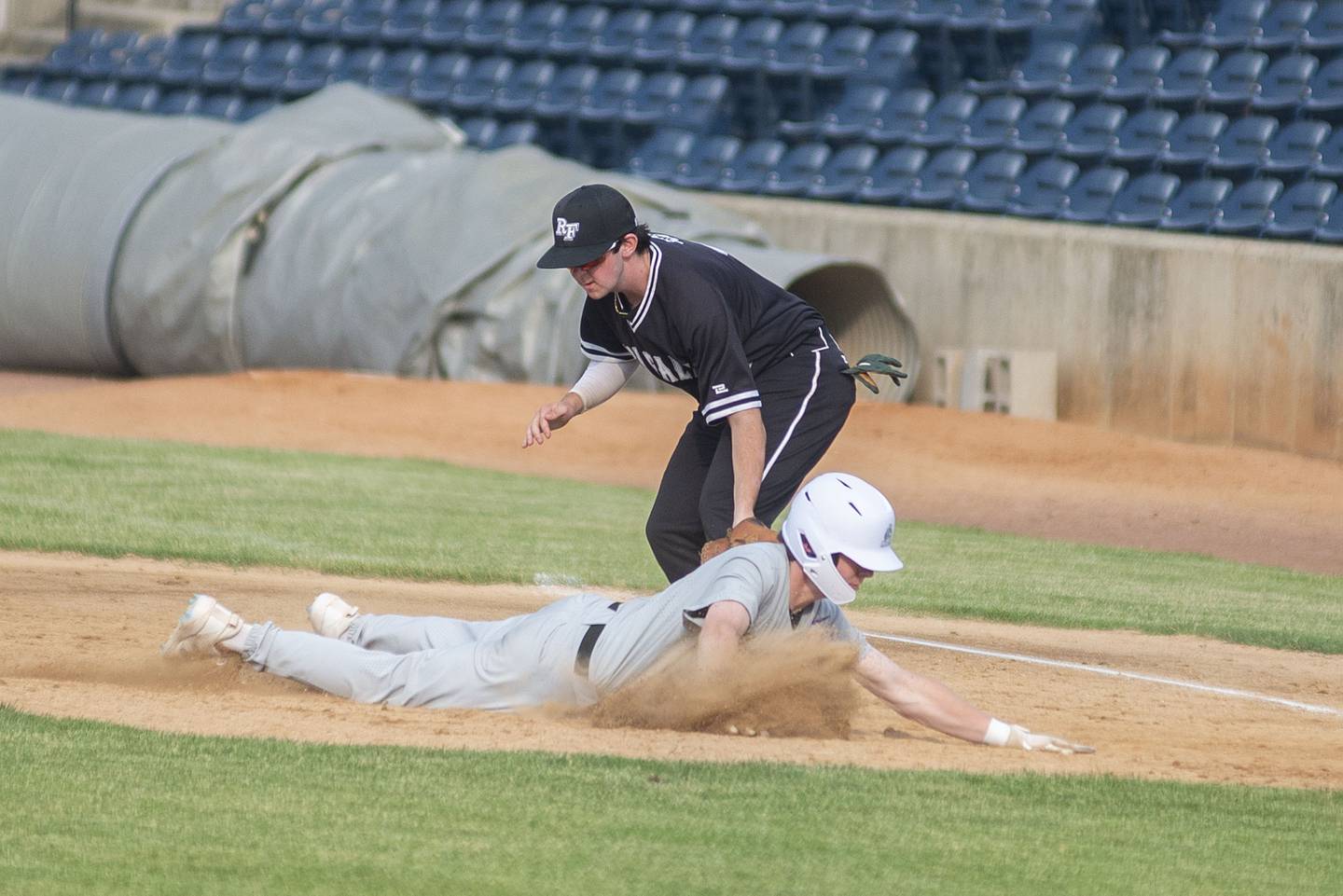 Rock Falls' Brady Richards tags out a runner Monday June 13, 2022 during the NIC-10 vs Big Northern Conference underclassmen all-star game.