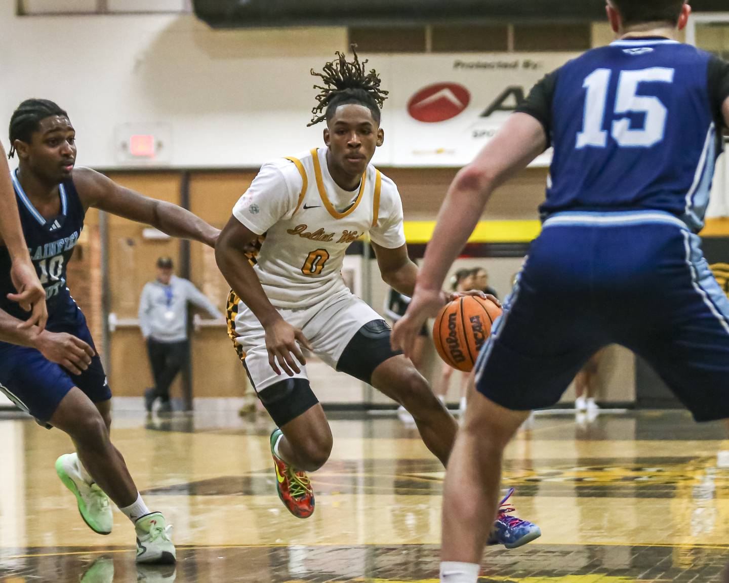 Joliet West's Aamir Shannon (0) makes a move down the lane during their basketball game between Plainfield South at Joliet West, Feb 2, 2026 in Joliet.