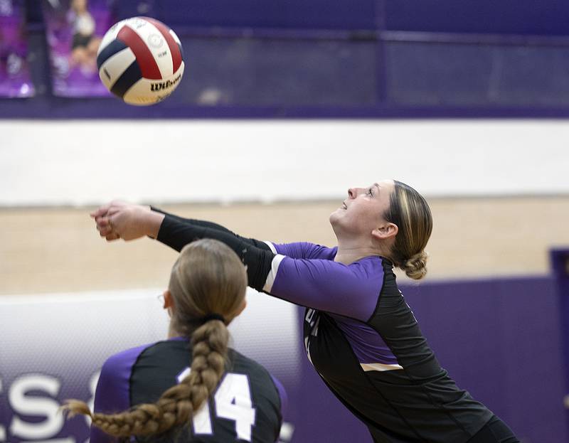 Dixon’s Presley Lappin reaches for a ball against Rochelle Monday, Oct. 28, 2024, during regional play in Dixon.