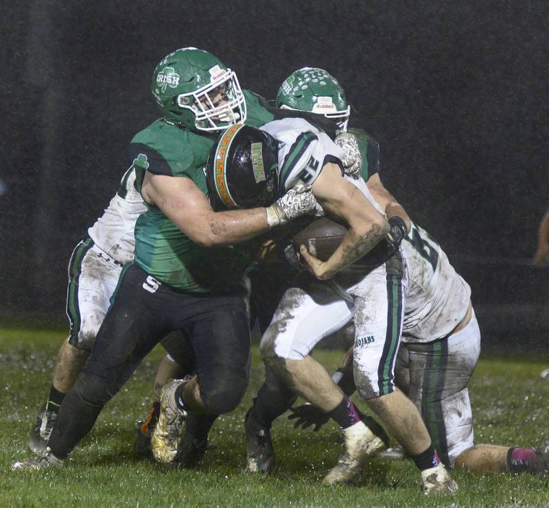 Seneca’s Casey Clennon brings down’s Dwight’s Seth Robertson on a run  in the 1st quarter Friday at Seneca.