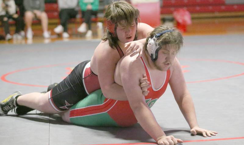 L-P's Eric Mateika wrestles Ottawa's AJ Trumbo on Thursday, Jan. 9, 2025 in Sellett Gymnasium at L-P High School.