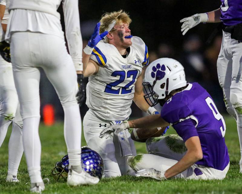 Moroa-Forsyth's Kaiden Maurer (22) comes up without his helmet after being tackled after running a keeper during Class 2A semi-final playoff football game between Moroa-Forsyth at Wimington.  Nov 18, 2023.