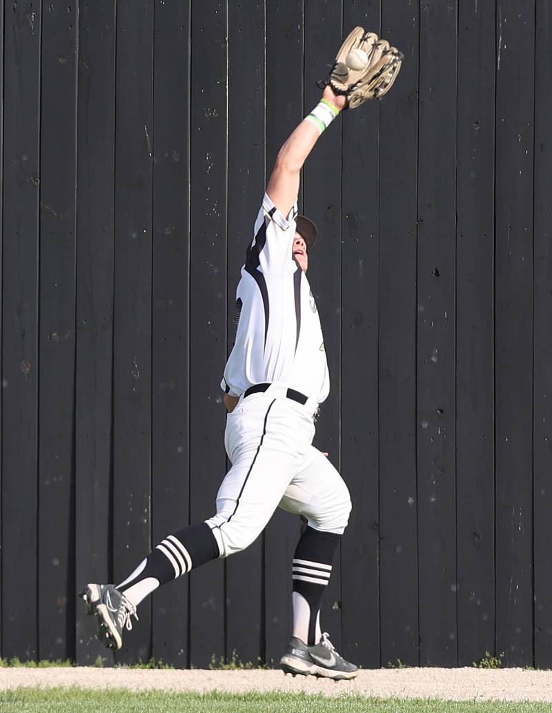 Sycamore's Kiefer Tarnoki makes a running catch during their game against Morris Tuesday, May 9, 2023, at the Sycamore Community Sports Complex.