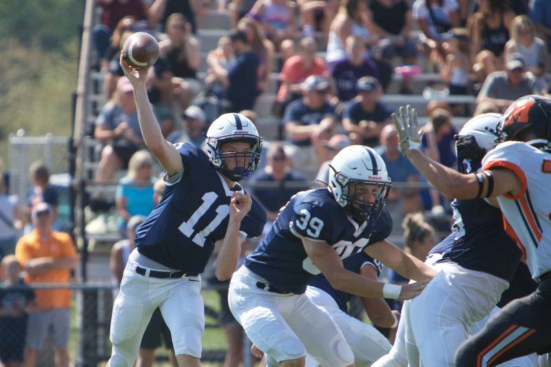 Cary-Grove's Peyton Seaburg throws for a gain against McHenry on Saturday, Sept. 17,2022 in Cary.