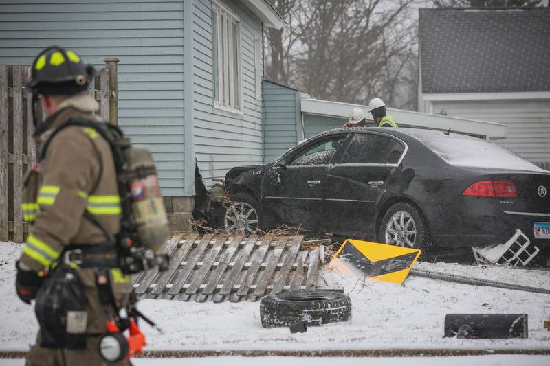 A car struck a house in the 8600 block of Route 14 on Thursday, Feb. 16, 2023. The city of Crystal Lake subsequently warned of a gas leak in the area.