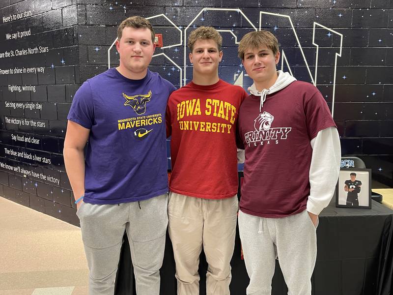 St. Charles North seniors (left to right) Henry Warsaw, Drew Surges and Will Vaske at their National Letter of Intent signing day ceremonies on Feb. 1. Photo by Jacob Bartelson.