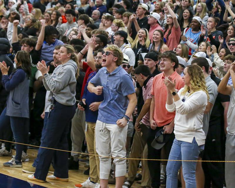 The Oswego student section cheers on the team during their basketball game between Oswego East at Oswego Friday, Jan 09, 2025 in Oswego.