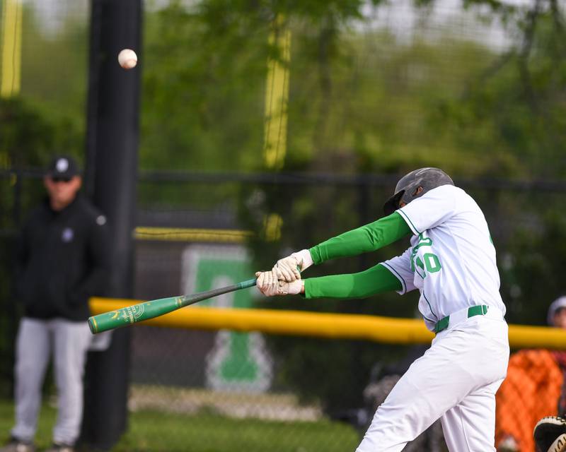 York's Evan Madiola (10) makes contact with the ball during the game on Monday May 19, 2025, while taking on Downers Grove North held at York High School in Elmhurst.