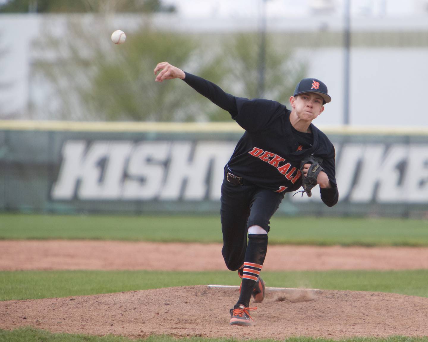 Dekalb's Jackson Kees delivers a pitch against Sycamore at Kiswaukee College on Saturday, April 29, 2023 in Malta.