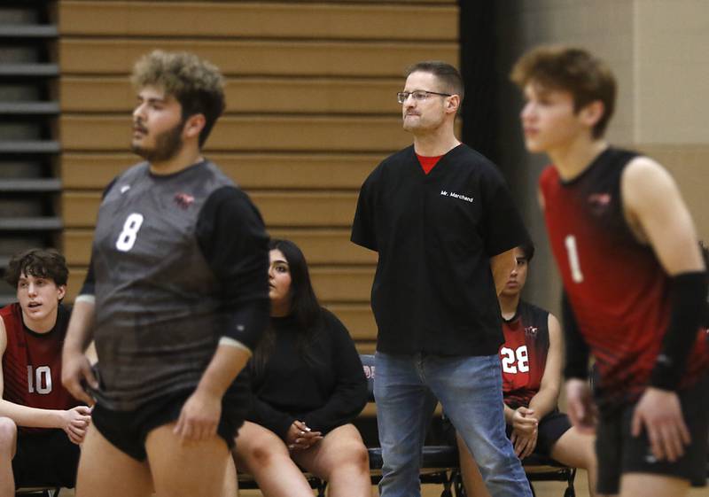 Huntley coach Gerry Marchand watches his team play during a nonconference boys volleyball match against St. Charles North Monday, May 8, 2023, at Huntley High School.