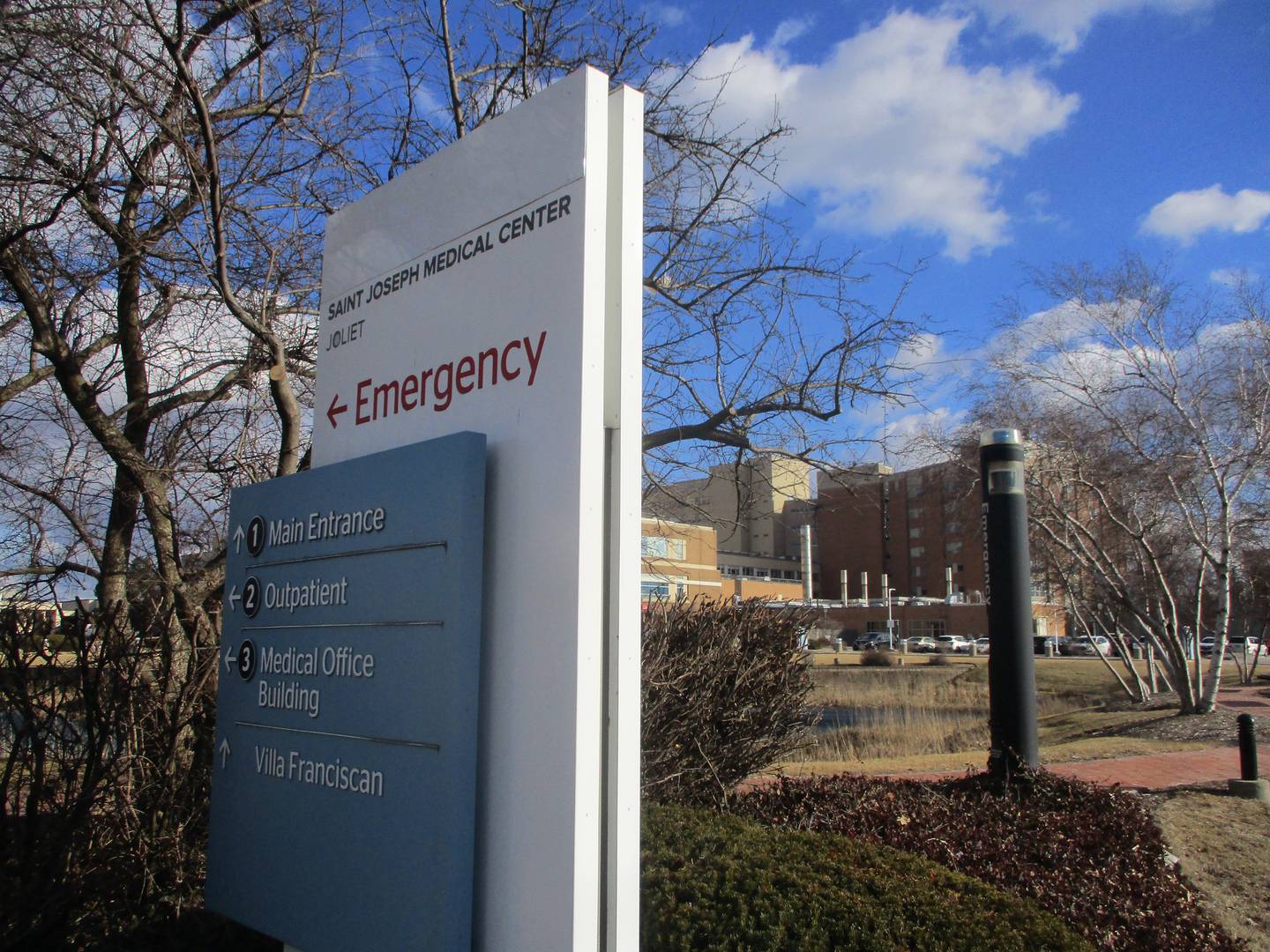Indications of corporate ownership were covered over on this and other signs at Saint Joseph Medical Center on Thursday. California-based Prime Healthcare will take ownership on Saturday. Feb. 27, 2025