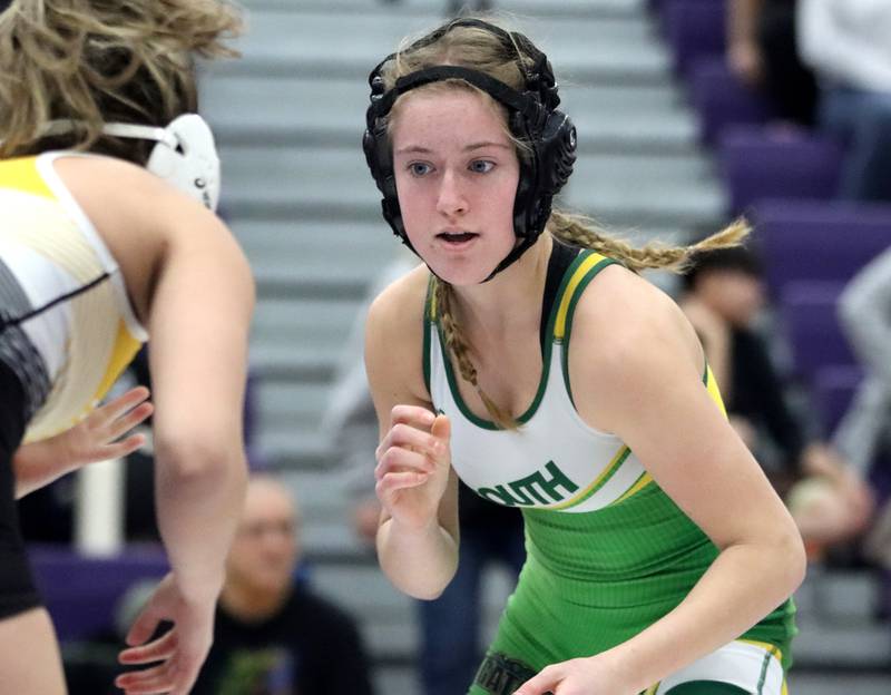 Crystal Lake South’s Annalee Aarseth faces off against Harvard’s Alexa Herrera at 110 pounds in IHSA Regional wrestling semifinal action on Saturday, Feb. 1, 2025, at  Hampshire High School  in Hampshire.
