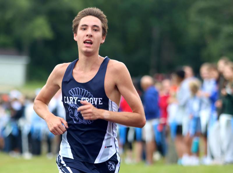 Cary-Grove’s Jameson Tenopir wins the varsity boys race of the McHenry County Cross Country Meet at Emricson park in Woodstock on Saturday, August 30, 2025.