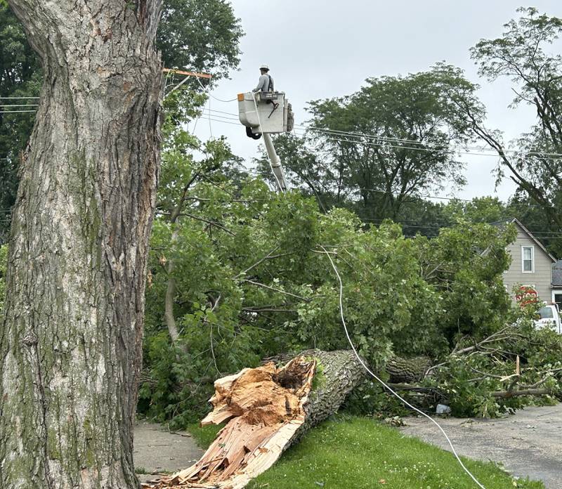 ComEd crews were busy Tuesday, July 16, 2024. repairing downed electrical lines and poles in Byron following Monday night's storm.