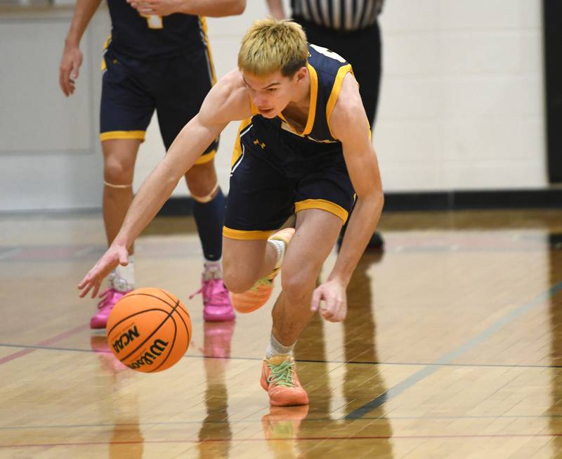 Polo's JT Stephenson steals the ball against Forreston on Saturday, Dec. 13, 2025 at the 64th Annual Forreston Holiday Basketball Tournament held at Forreston High School.