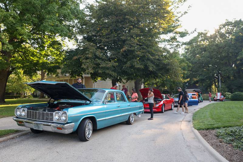 About 30 cars are on display during the Cruise-In Night at the Museum on Thursday, Aug. 14, 2025.