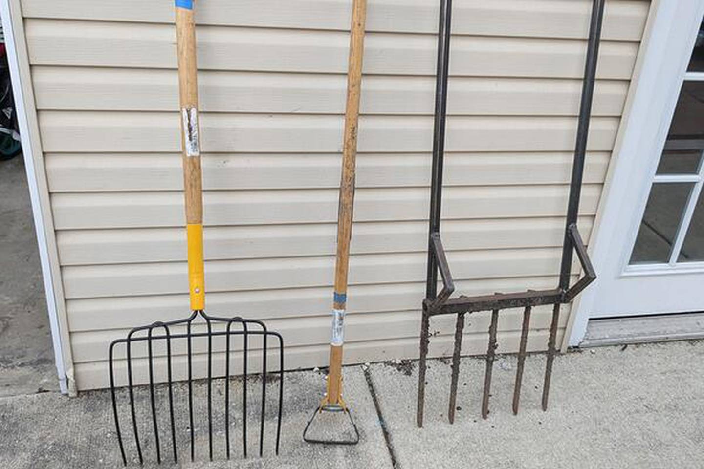 A set of gardening tools to add to the holiday wish list can include (left to right): a silage fork, stirrup hoe, and broadfork.