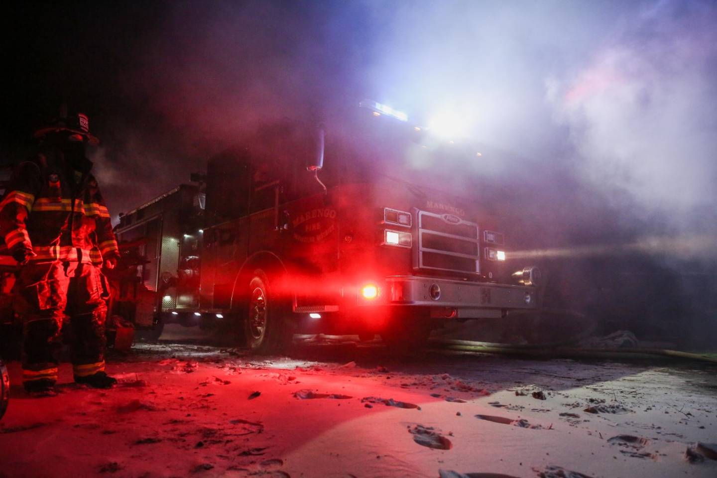 Firefighters put out a fire in frigid temperatures in Marengo Saturday night.