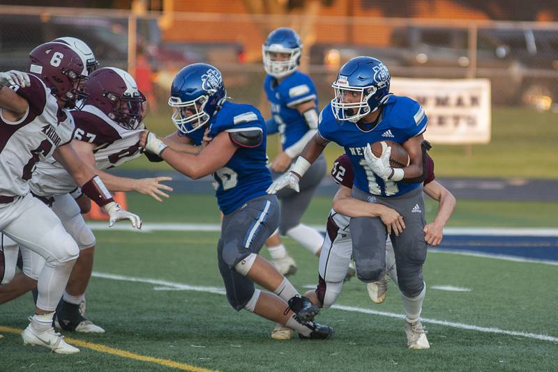 Newman’s Gabe Padilla looks for yards against Rockridge Friday, Sept. 2, 2022.