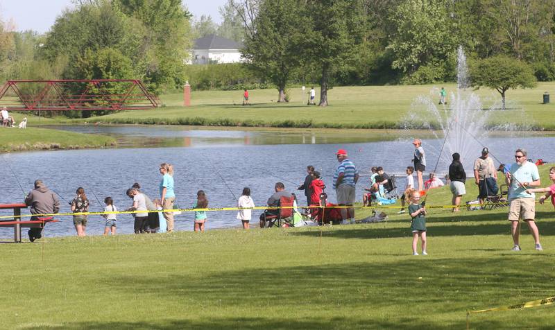 A large crowd gathers during the 25th annual Kids Fishing Expo on Saturday, May 10, 2025 at Baker Lake in Peru.
